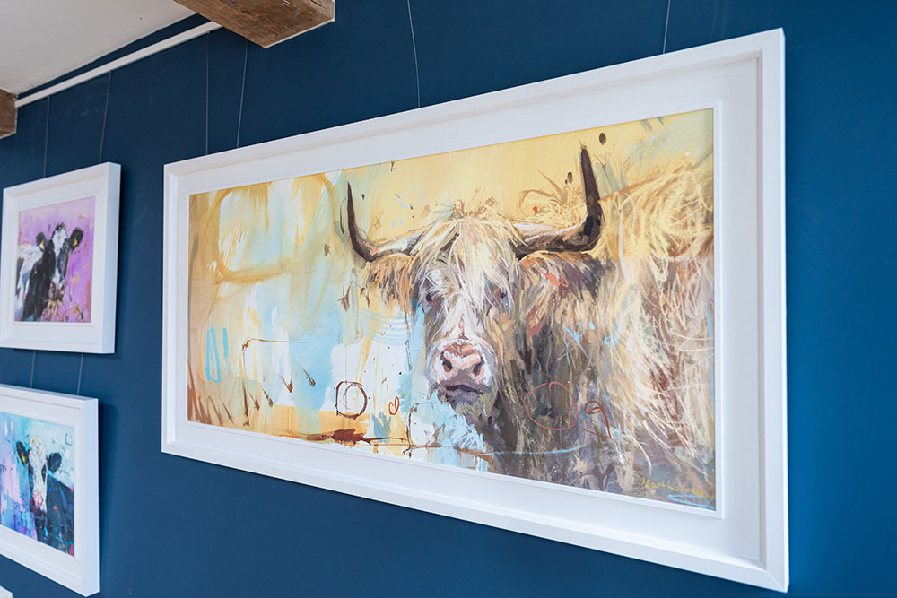 Highland on ochre canvas in wide white frame (SP299) Highland on ochre canvas in wide white frame (SP299)